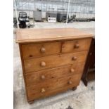 A VICTORIAN PINE CHEST OF TWO SHORT AND THREE LONG DRAWERS