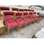 A SET OF TWELVE 1970s STACKING CHAIRS WITH LINK ATTACHMENTS