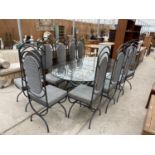 A MODERN GLASS TOP DINING TABLE 87" X 47.5" ON METAL X-FRAME BASE AND TEN CHAIRS (INCLUDES TWO