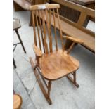 A VICTORIAN STYLE ROCKING CHAIR