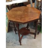 AN OGTAGONAL MAHOGANY SIDE TABLE WITH LOWER SHELF