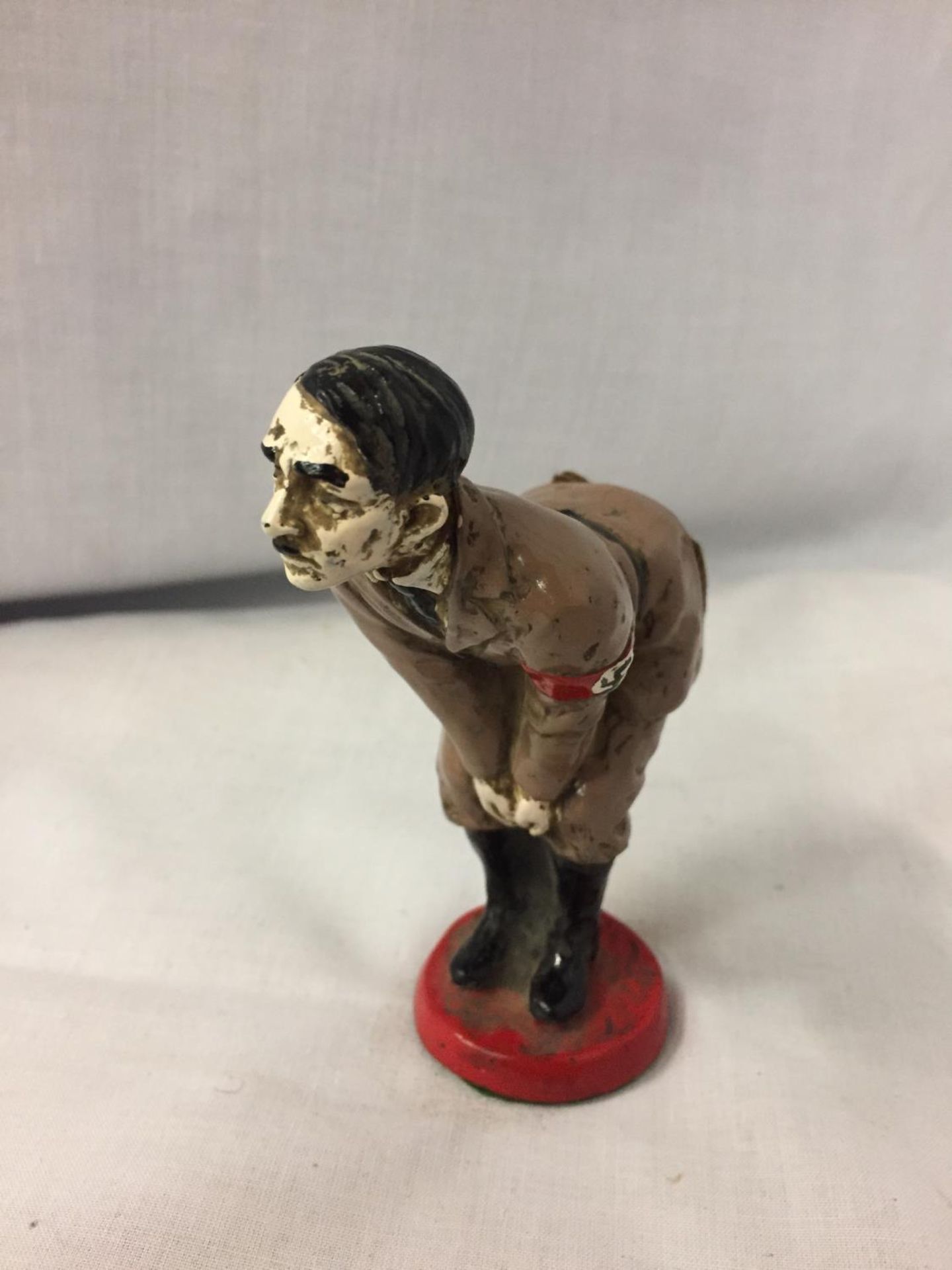 A COLD PAINTED ADOLF HITLER BRONZE FIGURINE PIN CUSHION