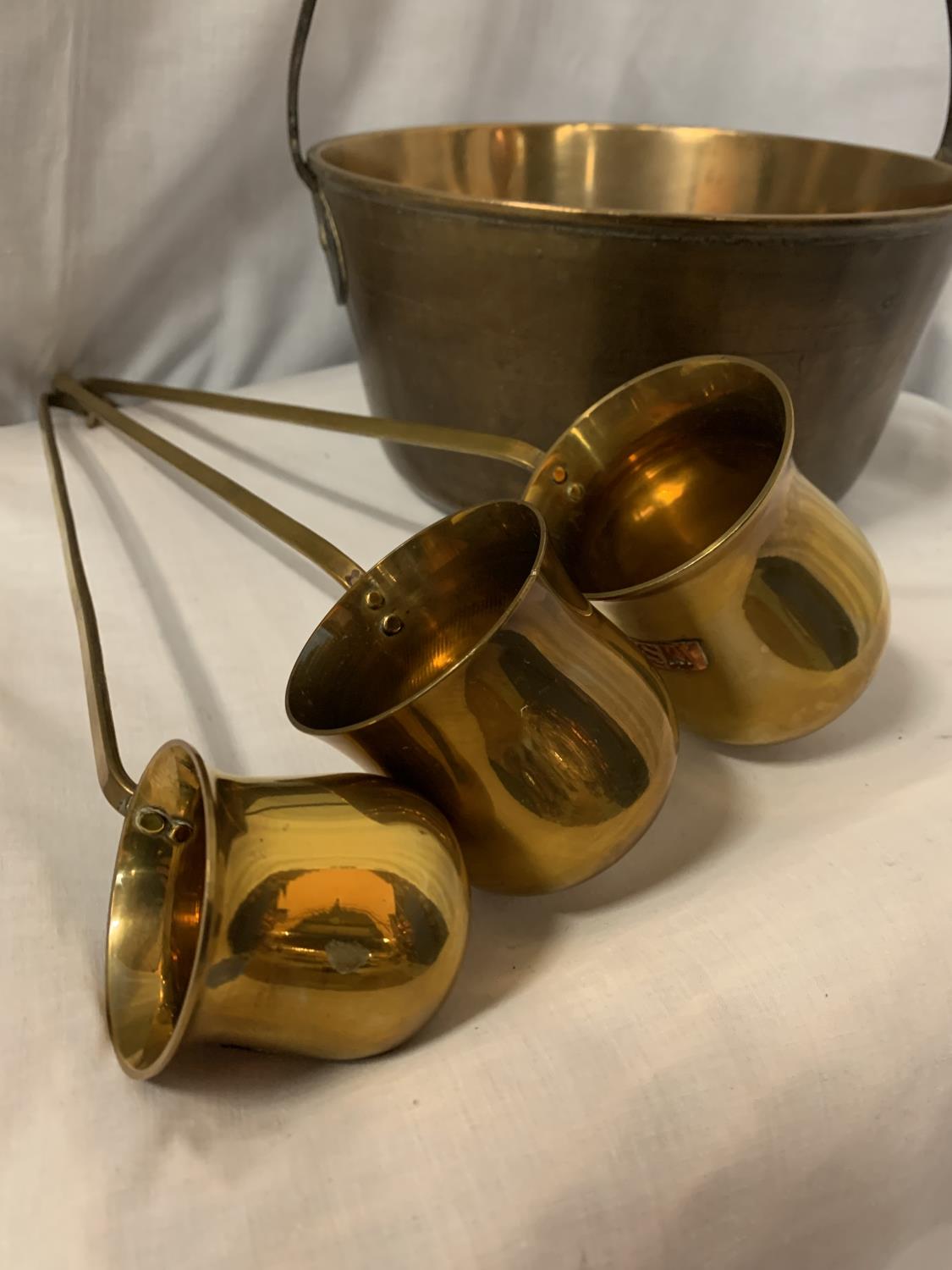 A BRASS JAM PAN AND THREE BRASS LADLES - Image 2 of 3