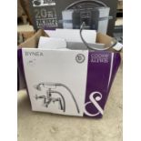 A SHOWER MIXER TAP AND A PRESSURE KING 20 IN 1 MULTI COOKER