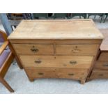 A VICTORIAN PINE CHEST OF TWO SHORT AND TWO LONG DRAWERS, 37" WIDE