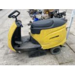 A KARCHER RIDE ON FLOOR CLEANER WITH KEY