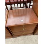 A STAG BEDSIDE CHEST WITH SLIDE