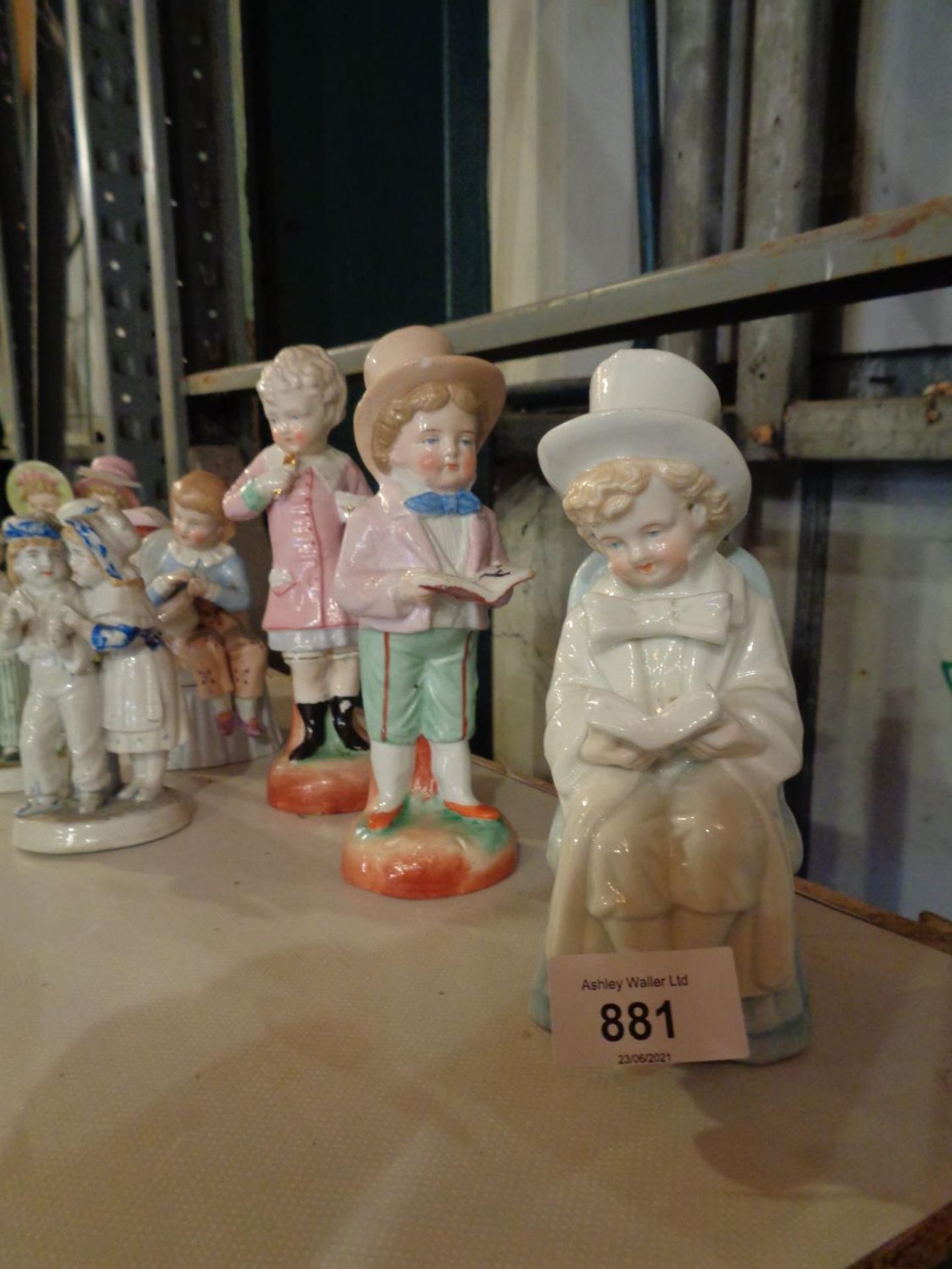 A COLLECTION OF FOUR CHILD FIGURINES - Image 2 of 3