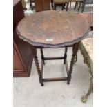 AN EARLY 20TH CENTURY OAK BARLEYTWIST OCCASIONAL TABLE, 22" DIAMETER