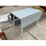 A MID 20TH CENTURY DROP-LEAF KITCHEN TABLE WITH FORMICA TOP