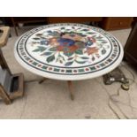 A 20TH CENTURY MARBLE EFFECT PROFUSELY INLAID COFFEE TABLE, 28" DIAMETER, ON FOLDING TEAK BASE, WITH