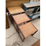 A RETRO TEAK G-PLAN NEST OF THREE TABLES