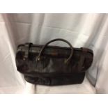 A LARGE LEATHER GENTS HOLDALL