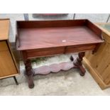 A VICTORIAN STAINED GALLERY BACK WASHSTAND WITH TWO TURNED COLUMNS