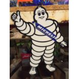 A SMALL MICHELIN MAN SIGN