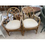 A PAIR OF BAMBOO EFFECT CHAIRS AND A FURTHER LLYOD LOOM STYLE CHAIR