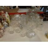 A LARGE COLLECTION OF CRYSTAL TO INCLUDE DRESSING TABLE ITEMS , BOWLS , CAKE STANDS