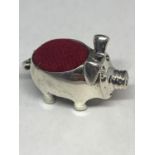 A SILVER PIN CUSHION IN THE GUISE OF A PIG