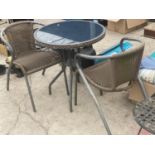 A MODERN BISTRO SET WITH ROUND TABLE AND TWO WICKER EFFECT CHAIRS