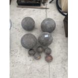 A SET OF VINTAGE WOODEN GARDEN SKITTLES 4 LARGE AND 5 SMALL