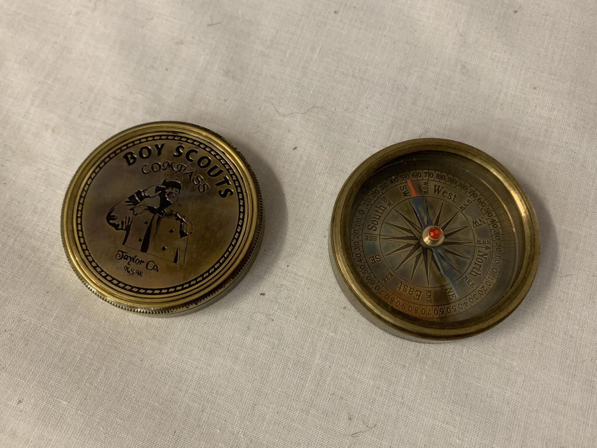 A BRASS BOY SCOUTS COMPASS