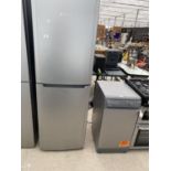 A SILVER HOTPOINT UPRIGHT FRIDGE FREEZER BELIEVED IN WORKING ORDER BUT NO WARRANTY