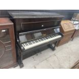 AN UPRIGHT EBONISED PIANOFORTE, STRAIGHT STRUNG BY SPENCER OF LONDON