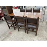 A JACOBEAN STYLE REFECTORY STYLE DINING TABLE, 72X32" AND SIX STUDDED CHAIRS