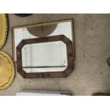 A GILT FRAMED MIRROR AND A FURTHER DECORATIVE WOODEN FRAMED BEVELED EDGE MIRROR