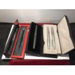 THREE BOXED PEN SETS