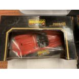 A BOXED 'DIE-CAST FERRARI 250 TESTA ROSSA' MODEL CAR