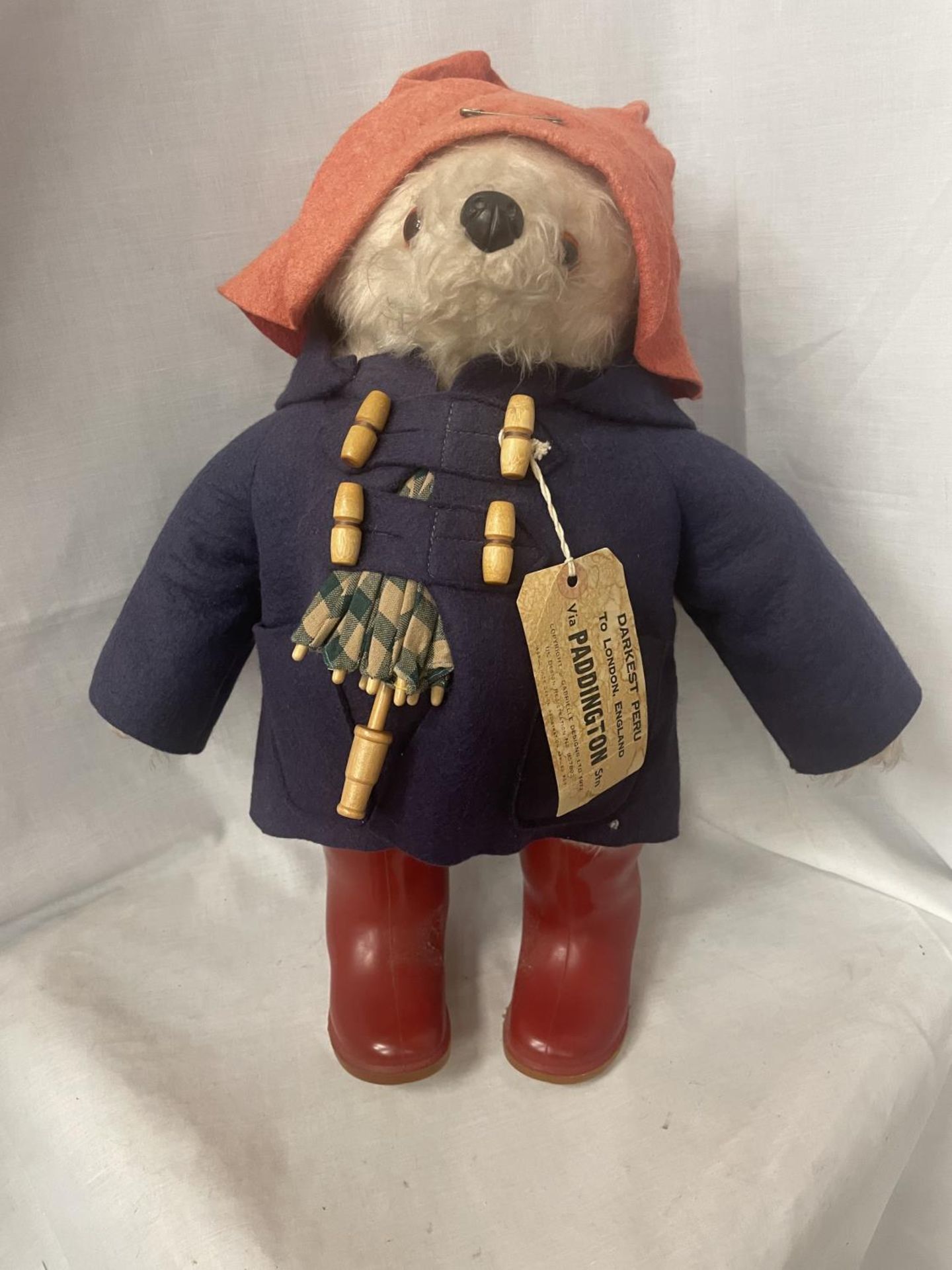 A PADDINGTON BEAR FIGURE WITH LABEL STATING GABRIELLE DESIGNS 1972, DESIGN NUMBER 957892