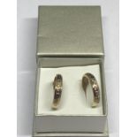 A PAIR OF 9 CARAT GOLD LOOP EARRINGS WITH A PRESENTATION BOX