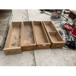 A GROUP OF FOUR WOODEN HABERDASHERY DRAWERS