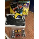 A BOXED F1 SUPER TEAMS SCALEXTRIC TRACK AND CARS