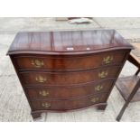 A MAHOGANY BOW FRONT CHEST OF FOUR DRAWERS