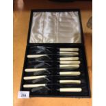 SIX FISH KNIVES AND FORKS IN A PRESENTATION BOX