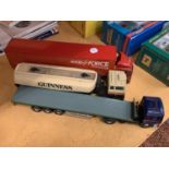 THREE CORGI WAGONS TO INCLUDE A GUINESS, PARCELFORCE AND FLATBED