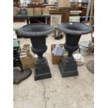 A PAIR OF DECORATIVE CAST IRON URNS ON PEDASTEL BASES (H:88CM)
