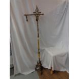 A BRASS AND ONYX STANDARD LAMP