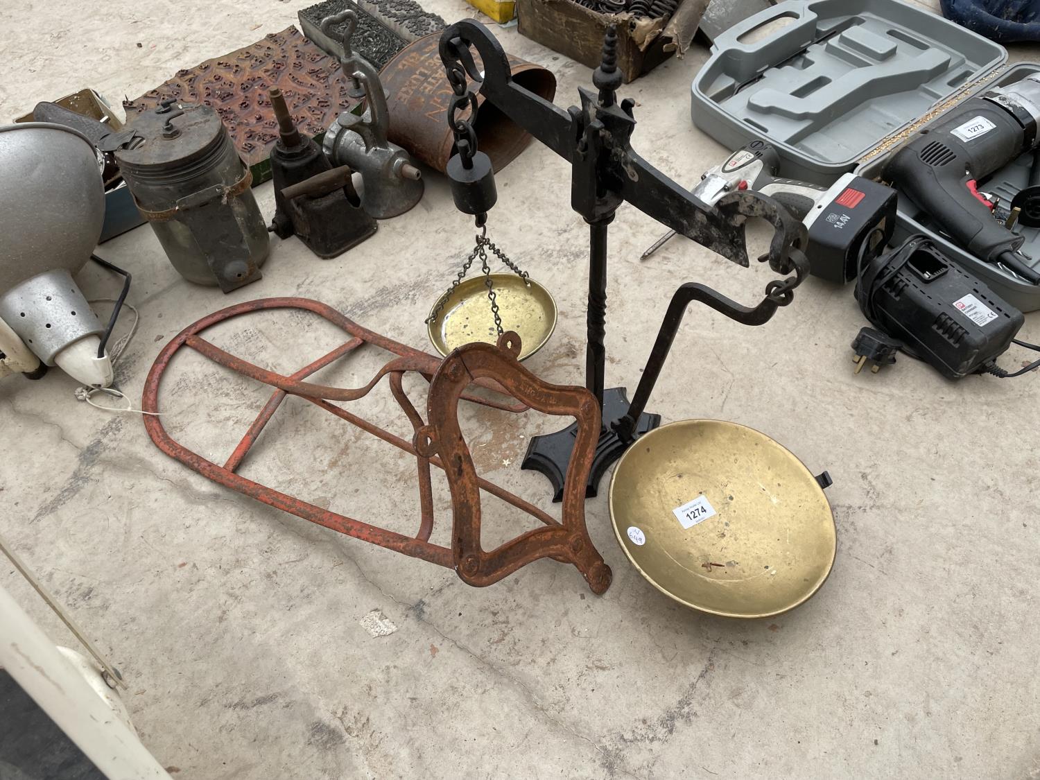 A SET OF BALANCE SCALES AND A VINTAGE SADDLE RACK