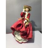 A ROYAL DOULTON FIGURINE TOP O THE HILL