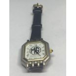 AN MG OWNERS CLUB WRIST WATCH WITH BLACK LEATHER STRAP SEEN WORKING BUT NO WARRANTY