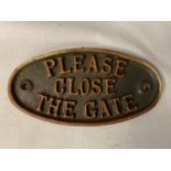 A CAST OVAL - PLEASE CLOSE THE GATE SIGN