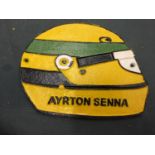 A CAST AYRTON SENNA SIGN IN THE GUISE OF HELMET