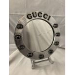 A GUCCI STYLE DRESSING TABLE MIRROR