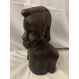 A CARVED HARDWOOD TRIBAL BUST OF A MAN H:27CM