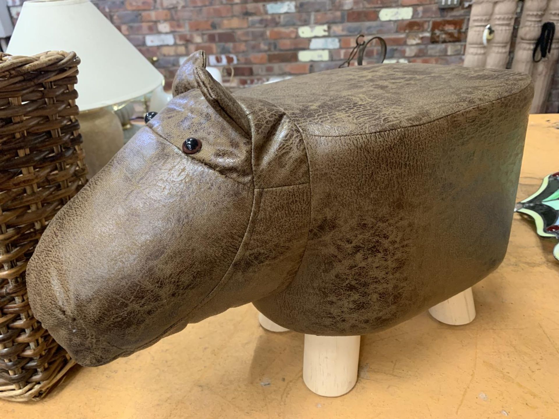 A FAUX LEATHER 'HIPPO' FOOTSTOOL/CHILDRENS STOOL