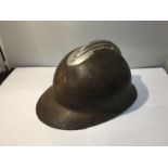 A VINTAGE WWI SERIES FRENCH ADRIAN HELMET