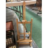 A WOODEN EASEL